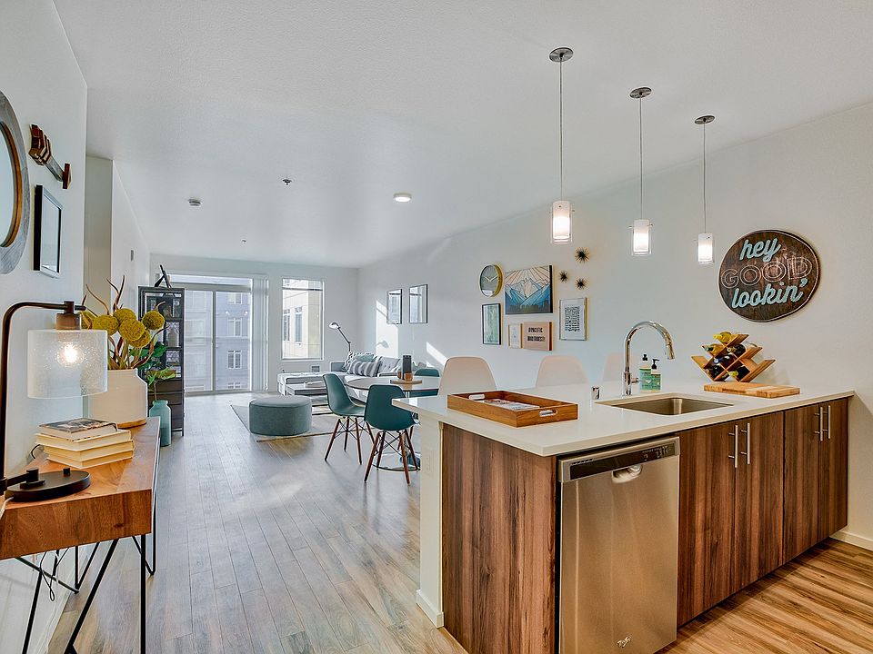 Spacious living and dining area filled with natural light
