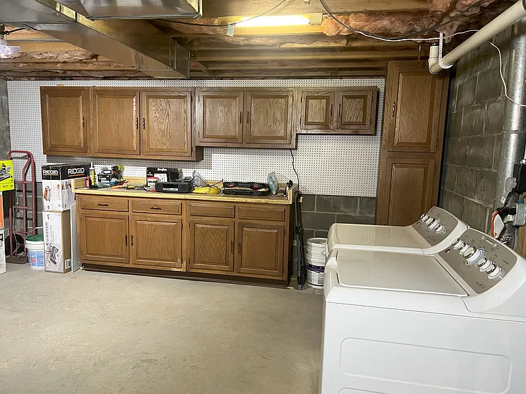 full basement with laundry area