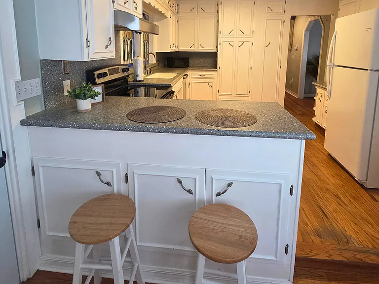 Open kitchen layout with comfortable dining space.