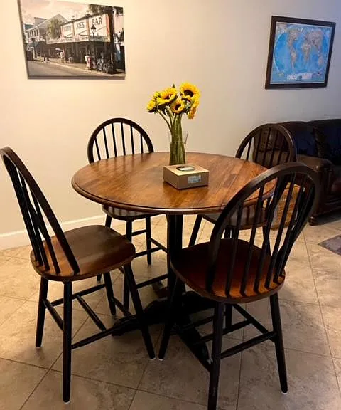 Ceiling fans are located in the dining area and the extra space behind the livingroom.