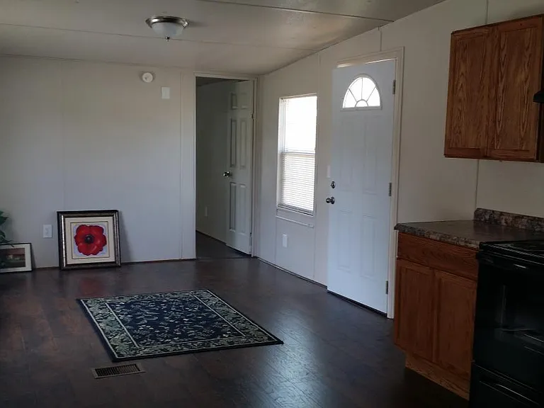 Den with Hardwood floors