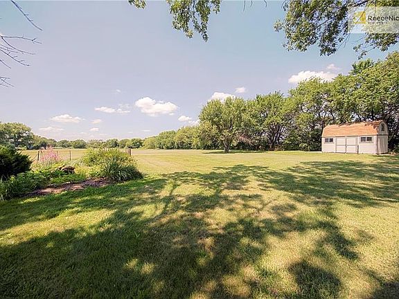 Stunning vistas from your back deck, over well maintained lawn area leading to pond and treed area