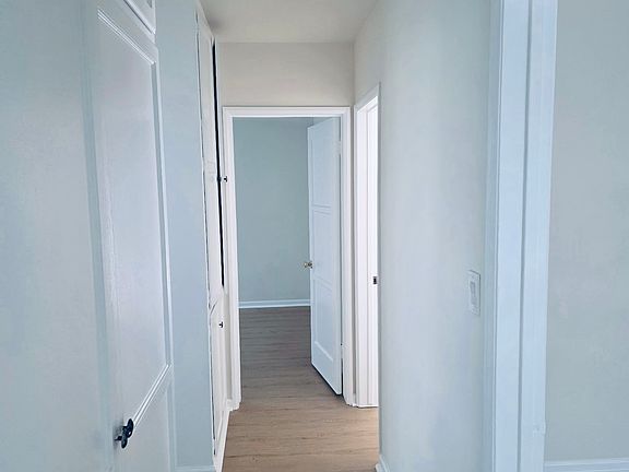 Hallway with lots of closet storage