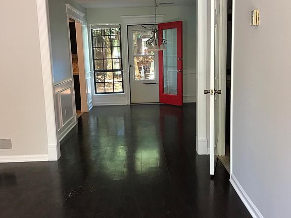 1st impression, living room and dining room , right: door to 1/2 bath.