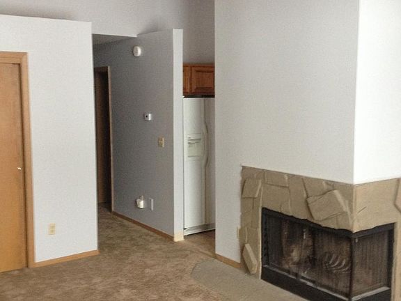 Living area, working wood fireplace.