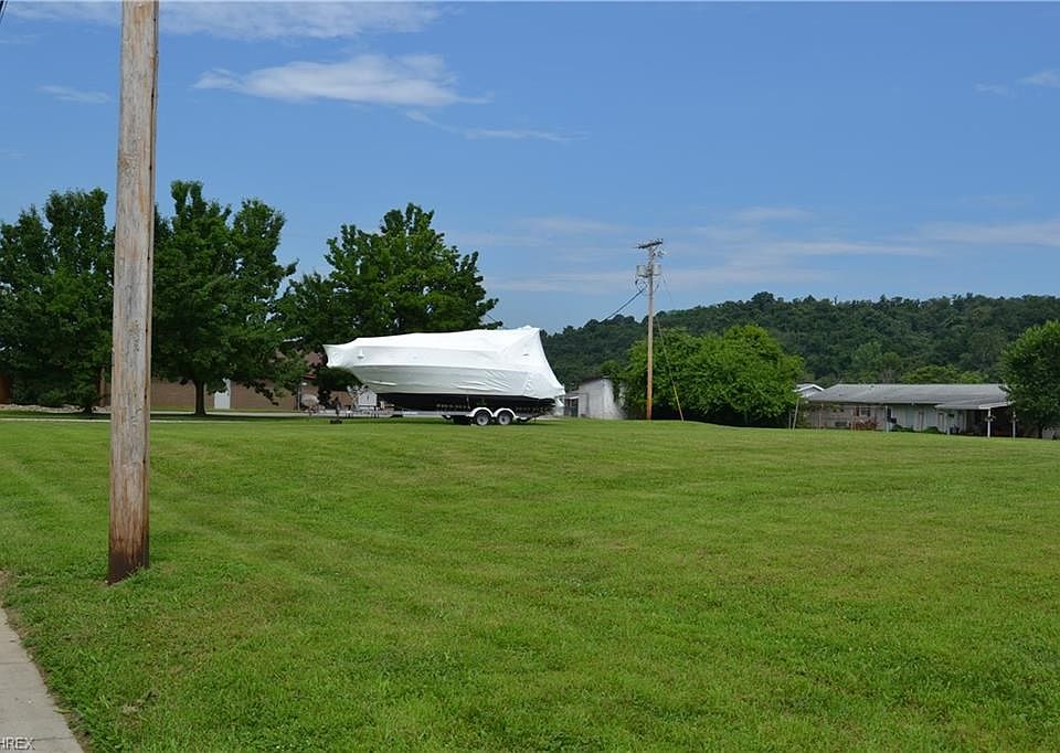 2714 Washington Blvd., Belpre, OH.  Sorry, the boat is not included in the price.