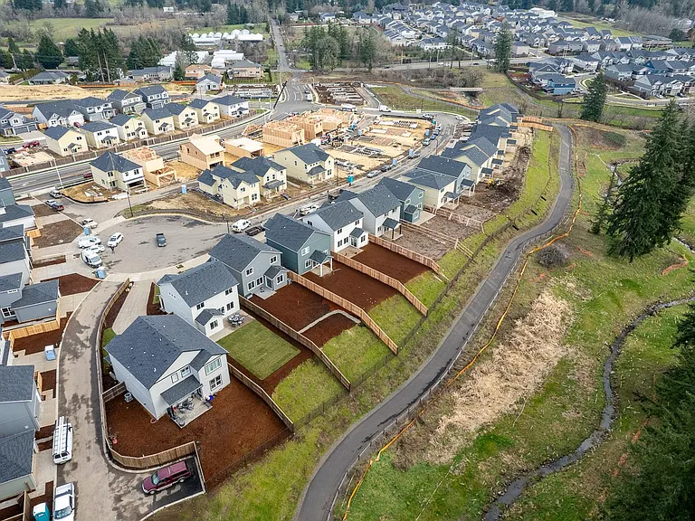 Walking trail backs up to property. This is an older photo and all construction in the community is 90% completed