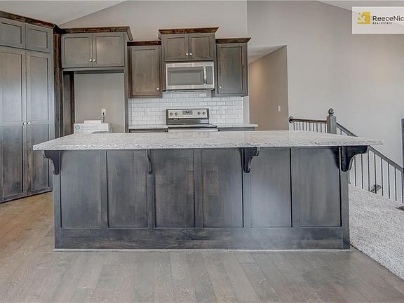 Dont miss the concealed cabinet door hinges, walk-in storage pantry andUSB charging outlet.