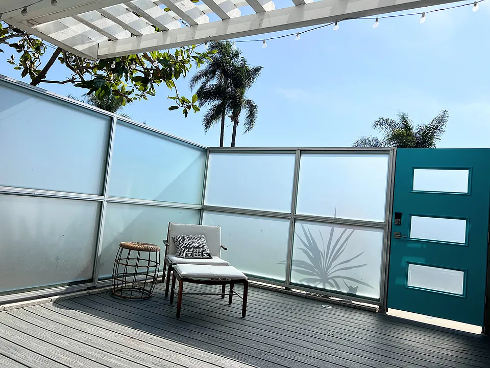 Glass, gated courtyard