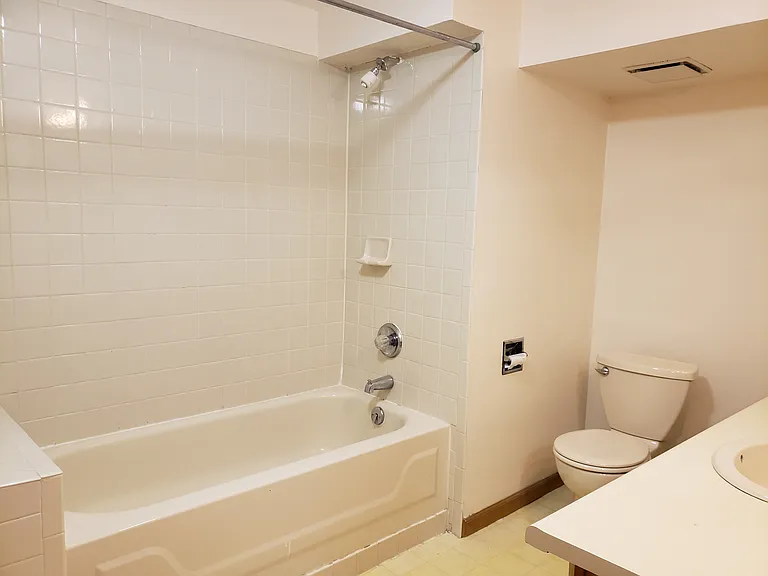 Large lower level bath, off bedroom
