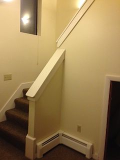 Stairs up to second level
