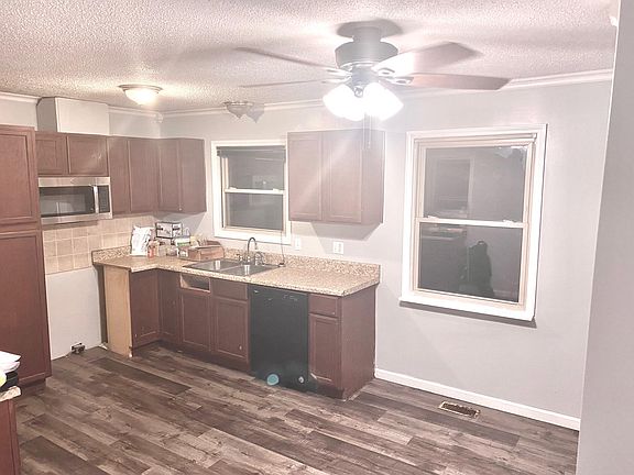 Kitchen w/ new over the range microwave & new floor