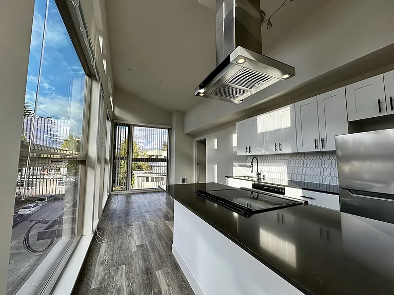 Kitchen with a view in this stunning 1-bedroom apartment