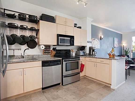 Open area kitchen connecting dining room to the main living room