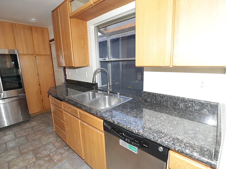Sink with dishwasher and ample storage