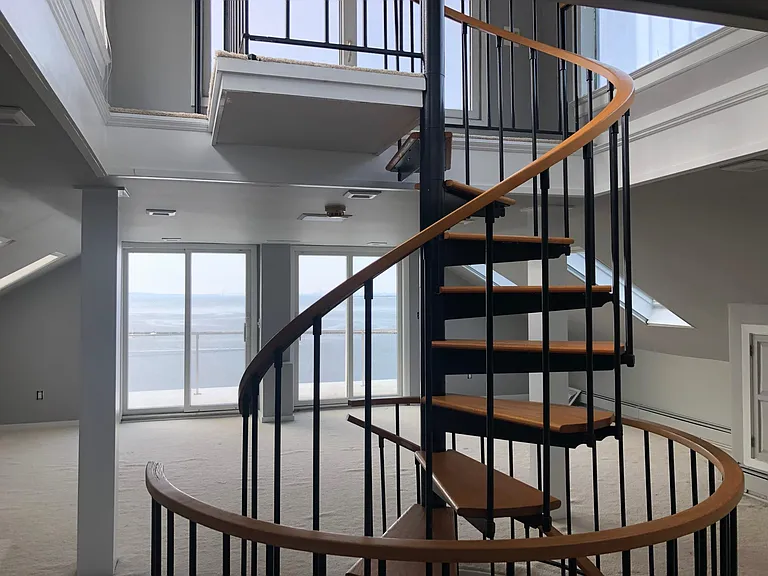 Loft area is flexible- work, sleep, play space. Amazing views, large upper deck and a viewing tower, too!