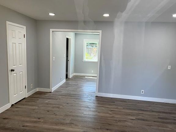 Living room, kitchen, laundry and half bath downstairs