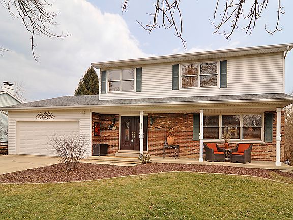 NEW ARCHITECTURAL ROOF, PELLA WINDOWS, GARAGE DOOR & SIDE DOOR, A/C UNITS, SUMP PUMP & MORE.