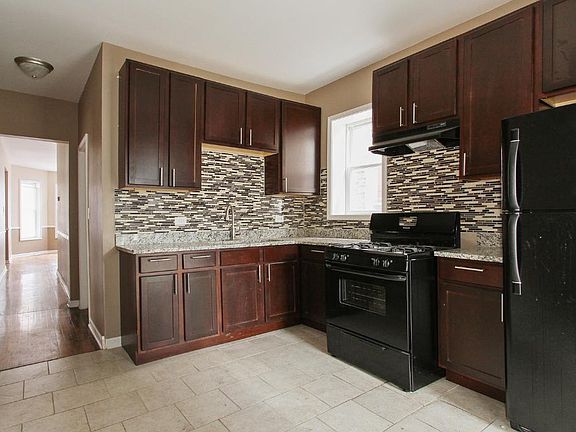 4th image of 7528 S Peoria St #1ST