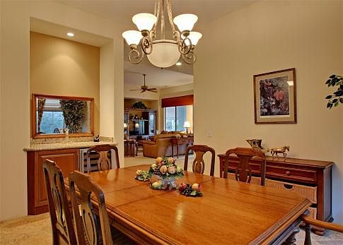 Formal dining room with bar/wine cooler.