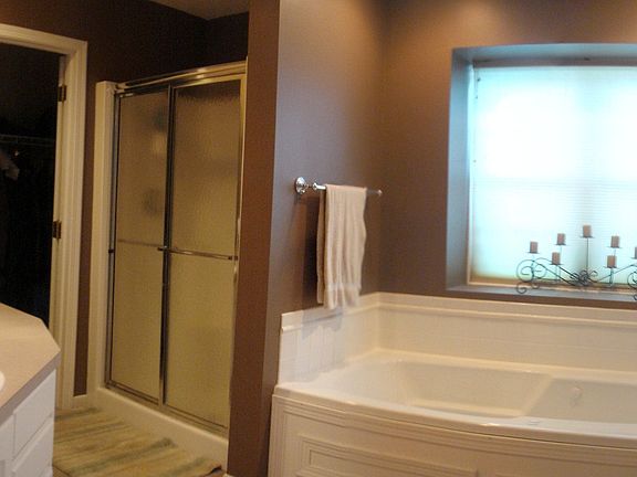 Fabulous Master bath includes jetted tub, separate shower, & double sinks.