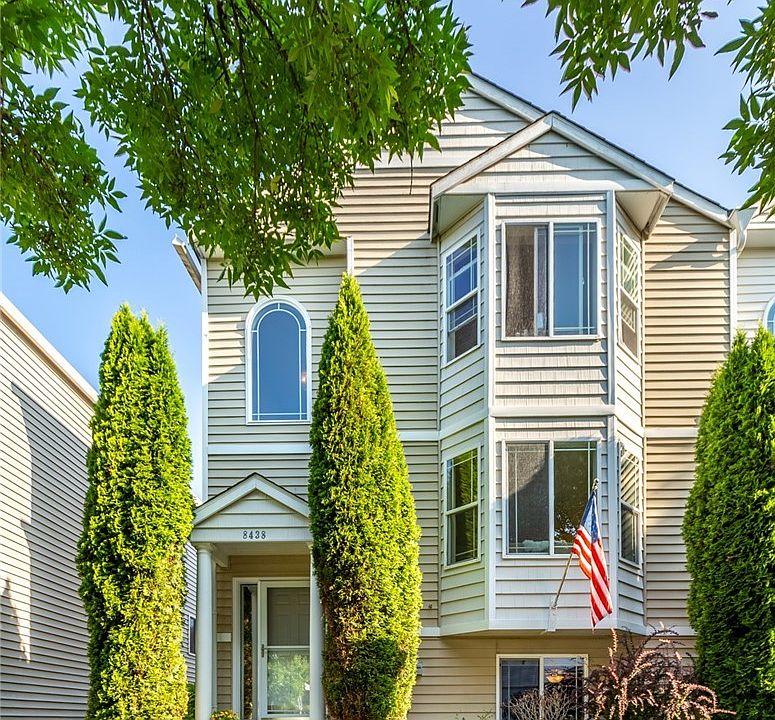 Front of home faces a stunning street lined with mature trees!