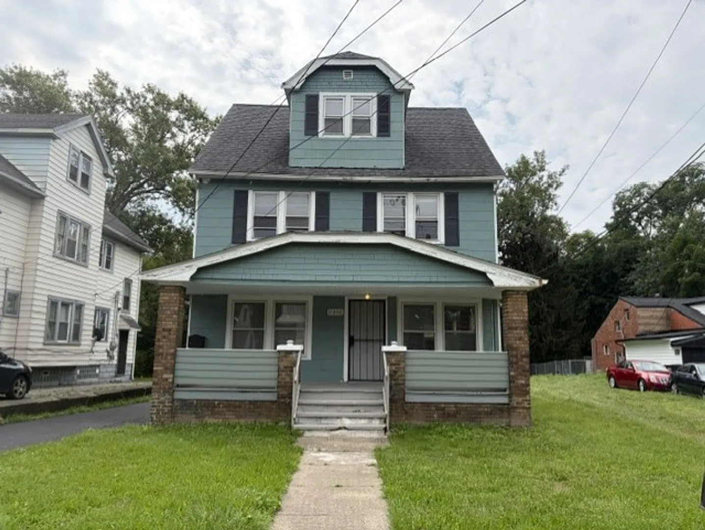 Must-See 5-Bedroom Home with a Large Kitchen, Two Full Bathrooms and Updated Driveway — Photo 1