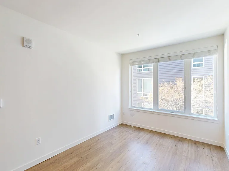 Apartment Living Room with Wood-Style Flooring.
