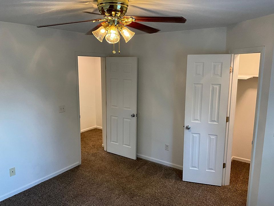 Primary bedroom with walk-in closet