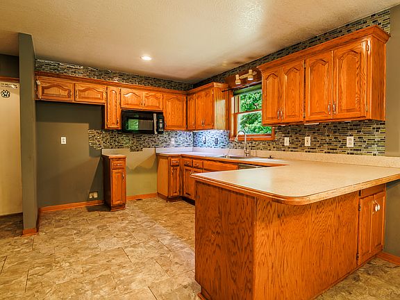 2nd image of 5504 NW Whispering Oaks