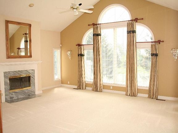 Great Room W/ Fireplace and great views of the golf course