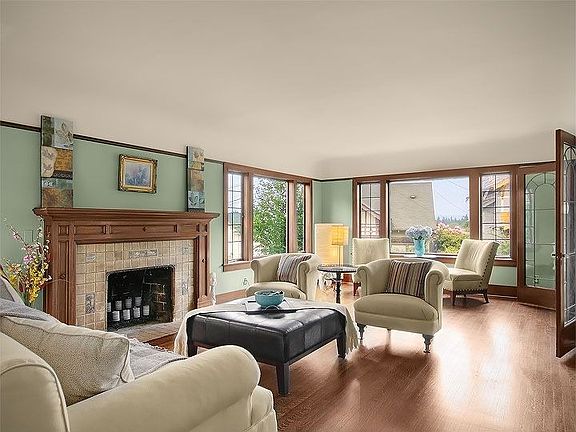 gracious living room with a dramatic mahogony fireplace