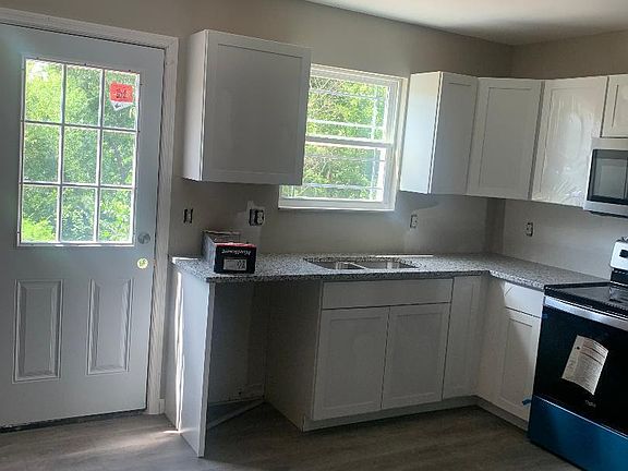 Kitchen area with back door