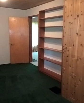 Main level 2nd bdrm with built in shelving & large closet