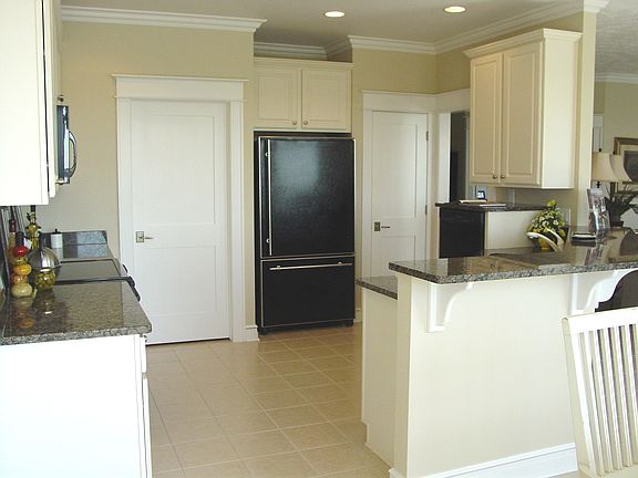 Floor plans and photos shown may include base features along with additional options and upgrades.