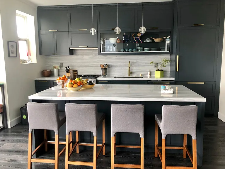 Luxurious, updated, modern kitchen with large island.