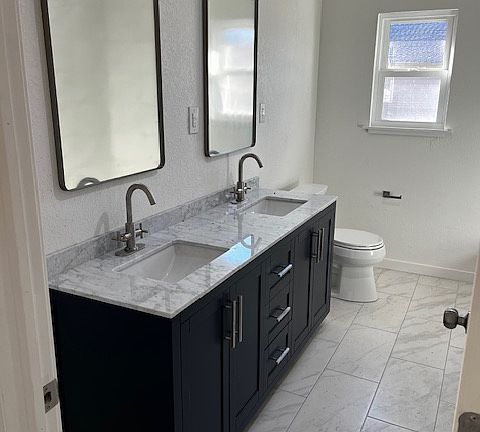 Guest bathroom with dual vanity