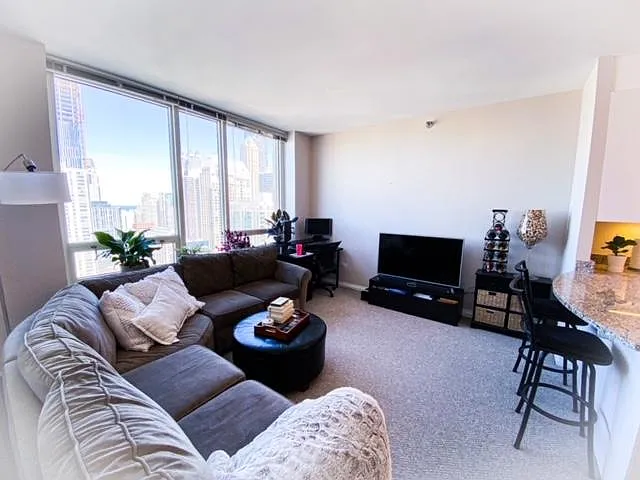 Living room open to kitchen area