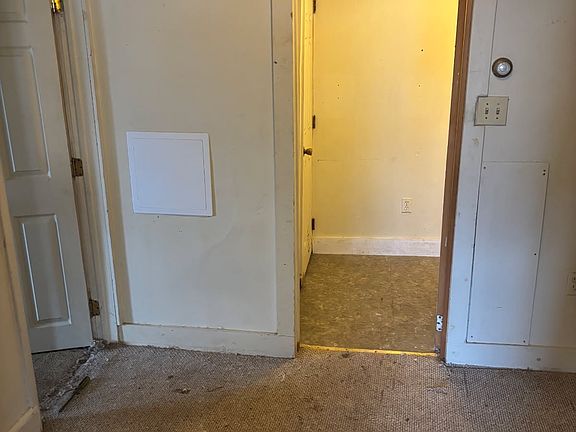 prior living room between kit and bath room.