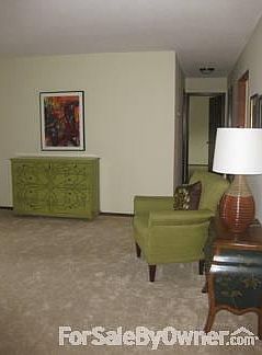 Living Room ~ peek of Screened Porch