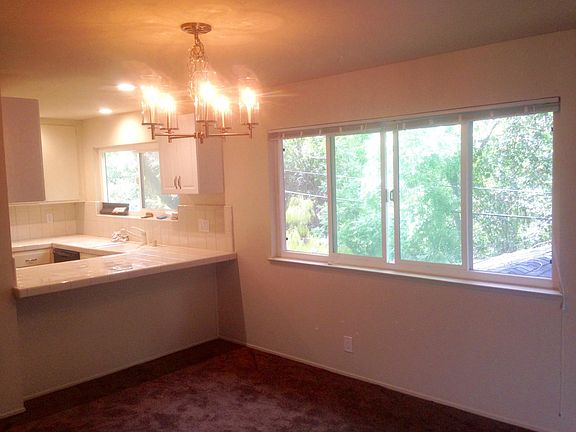 Dining room, next to Kitchen, view of trees next to Calabazas Creek.