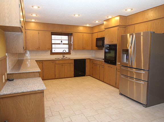 Remodeled Kitchen w solid surface counters
