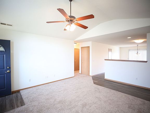 View of the chamfered living room ceiling.
