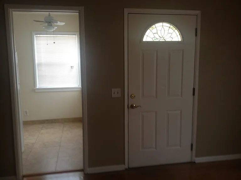 front door and view of breakfast nook