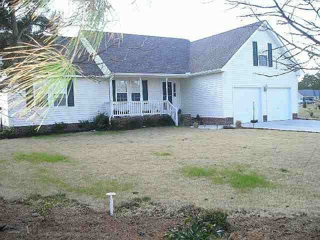 1st image of 105 NW Saddle Club Way