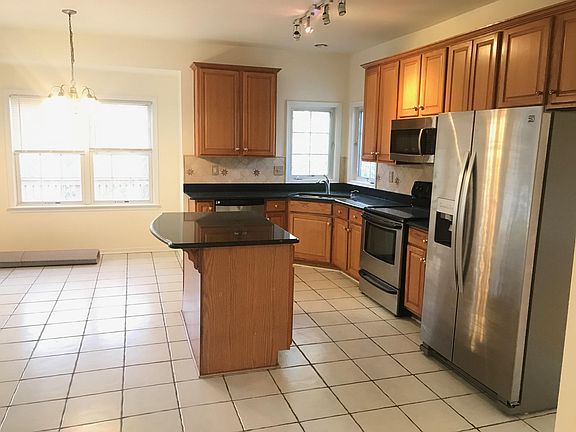 Wide open Kitchen with stainless steel Appliances