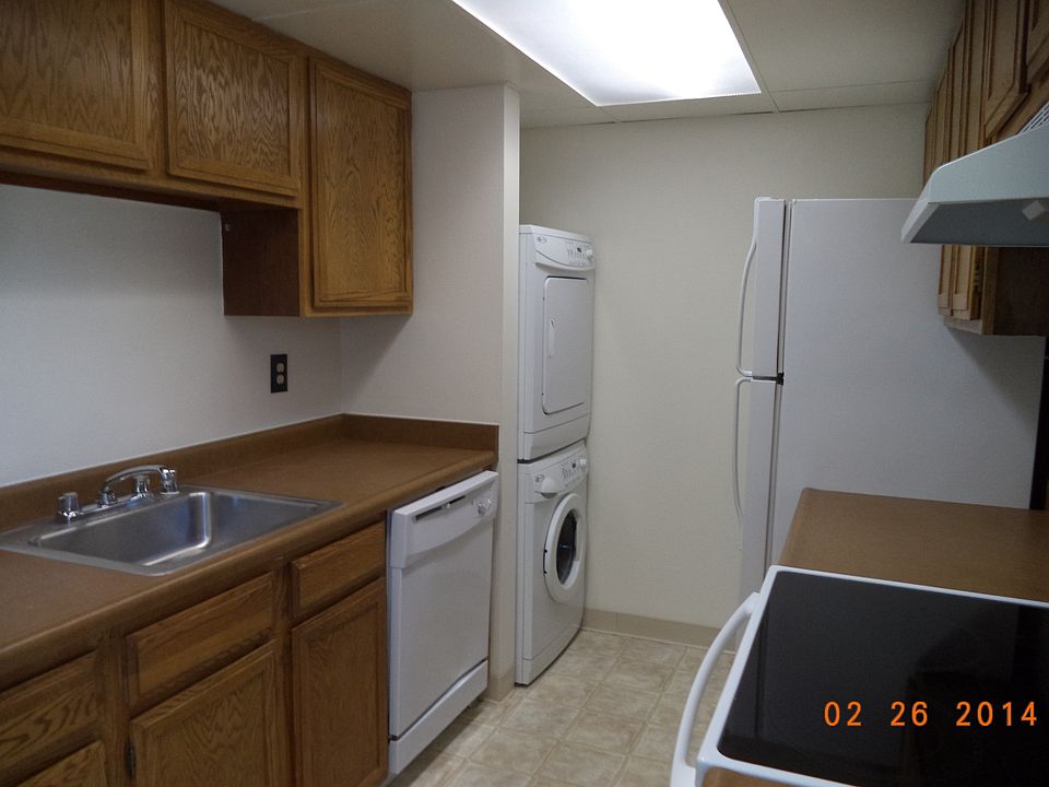 Kitchen with washer and dryer