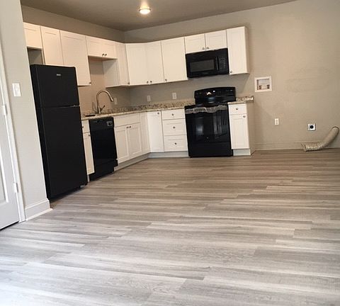 Brand new kitchen with laundry hook-ups.