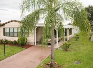 705 Hyacinth Cir, Barefoot Bay, FL 32976