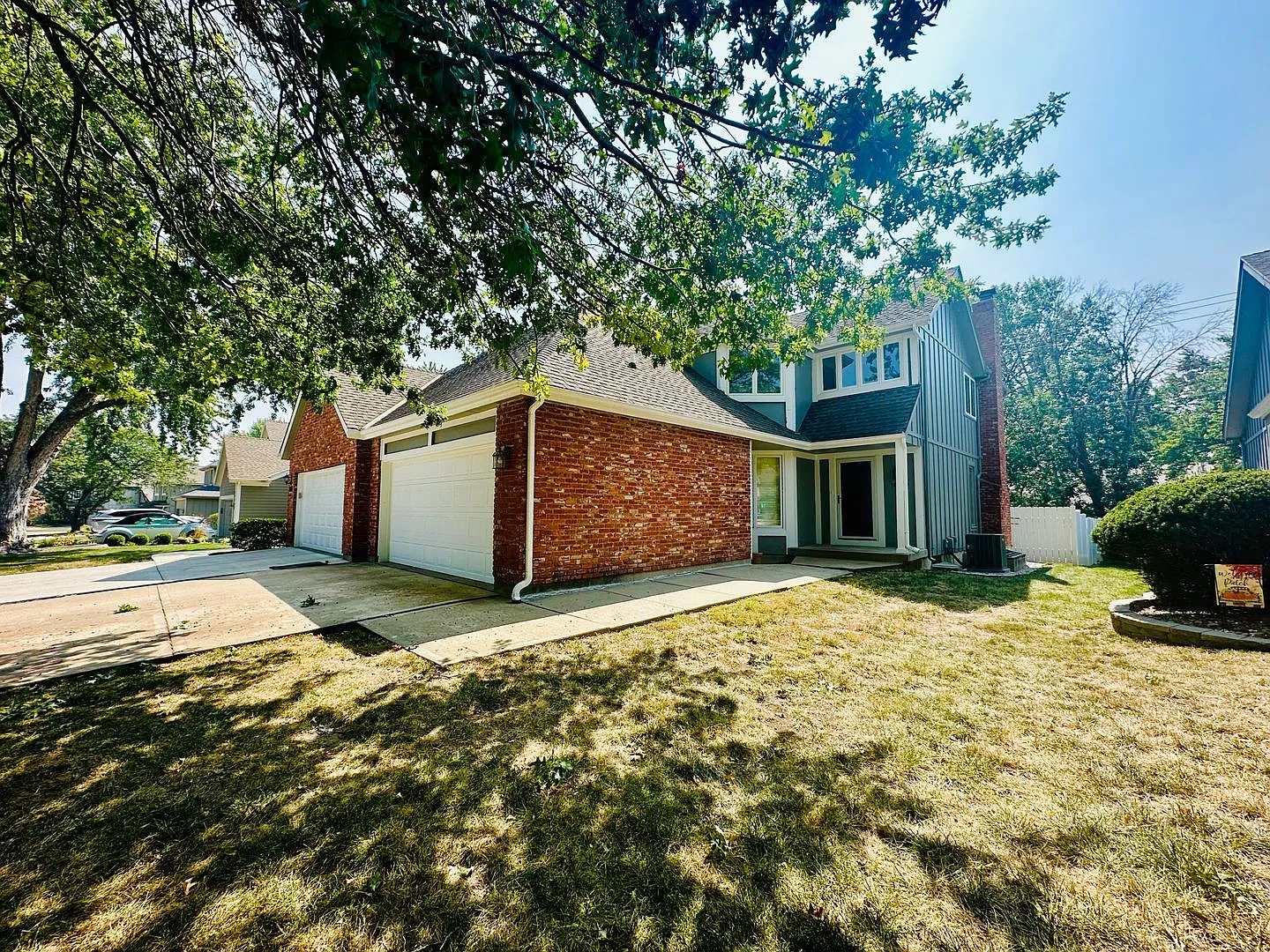  10709 Spacious Overland Park Duplex + Two Car Garage + Finished Basement — Photo 2